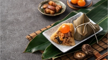Zongzi with salted egg yolk filling, traditionally eaten during the dragon boat festival