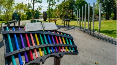 Musical playground at Propnex Family Zone, featuring a giant xylophone, drums and other percussion instruments in the background. Propnex Family Zone is a family-friendly park.