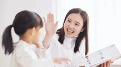 A mom helping with her daughter's homework